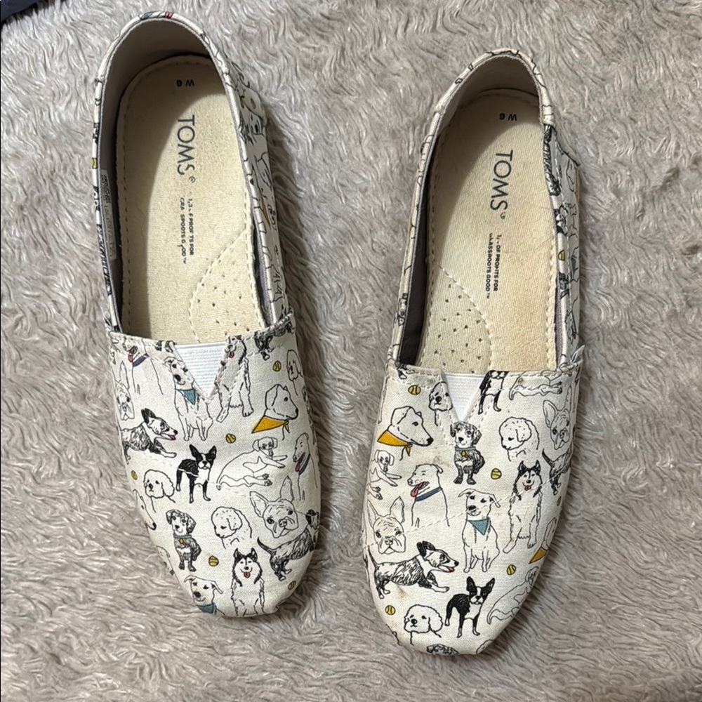 TOMS' Cream Dog shoes. Hardly worn, one small imperfection as shown in 4th pic